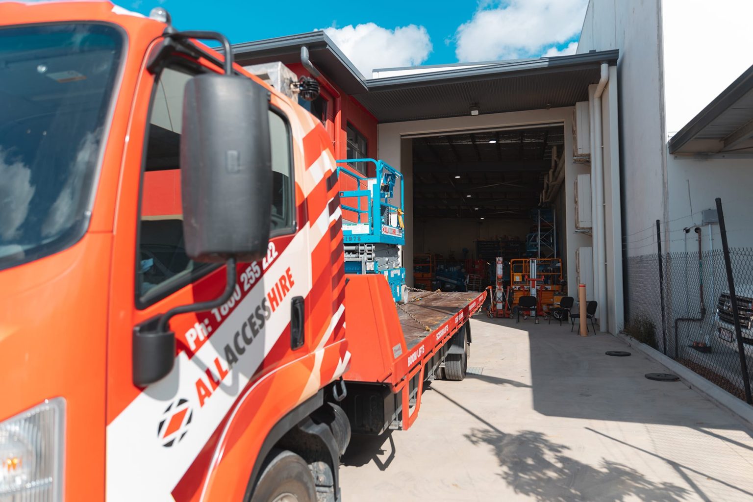 All Access Hire Truck with a Scissor Lift on the trailer