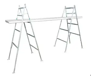 Aluminium plank platform supported by scaffold trestles hire setup for elevated indoor work